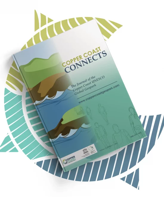 The cover of "Copper Coast Connects" showcases vibrant illustrations of coastal landscapes and waves beneath a compass rose. Highlighting the Copper Coast UNESCO Global Geopark, it invites readers to explore more through the website link at the bottom.